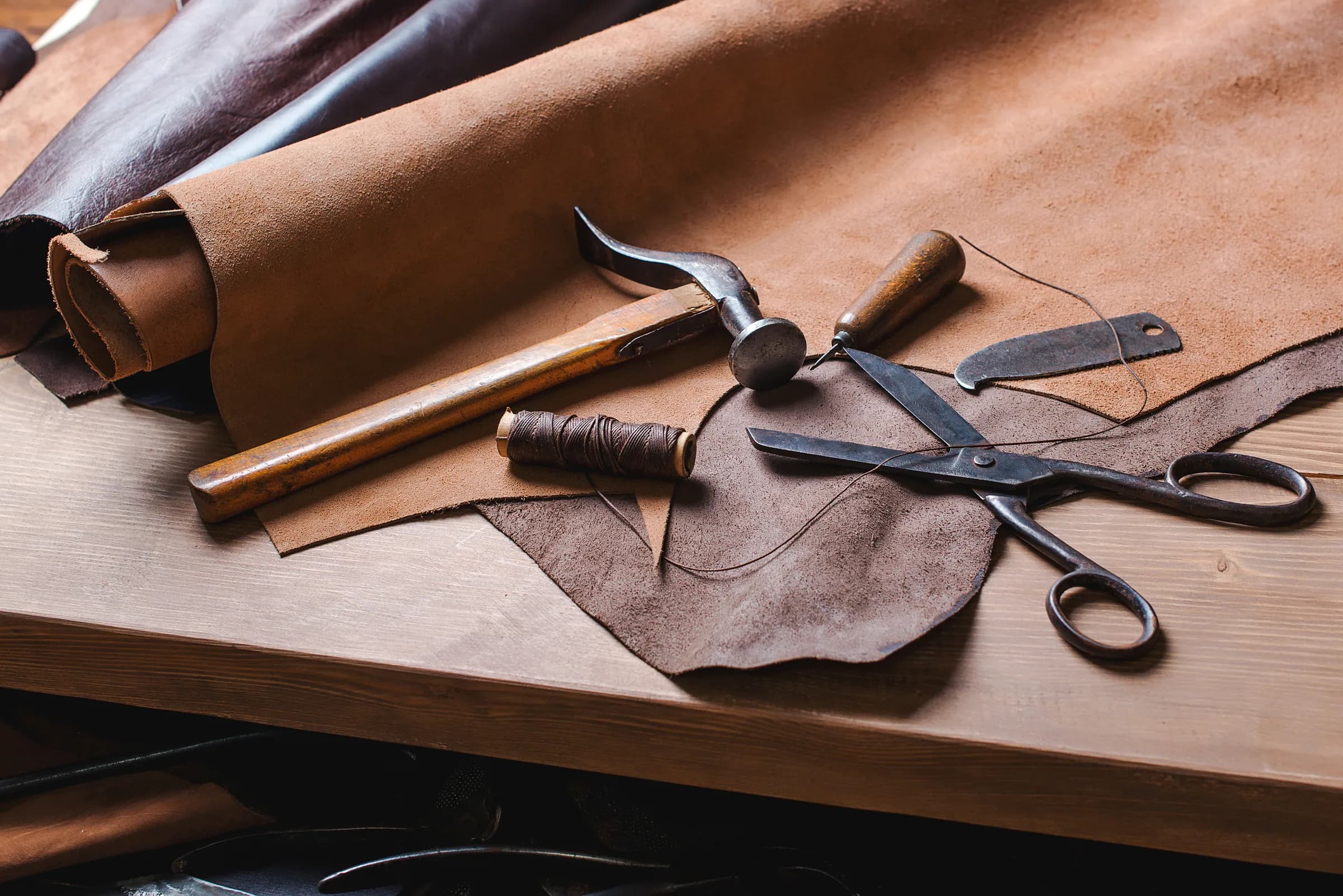Leather worker's cutting bench with hand tools