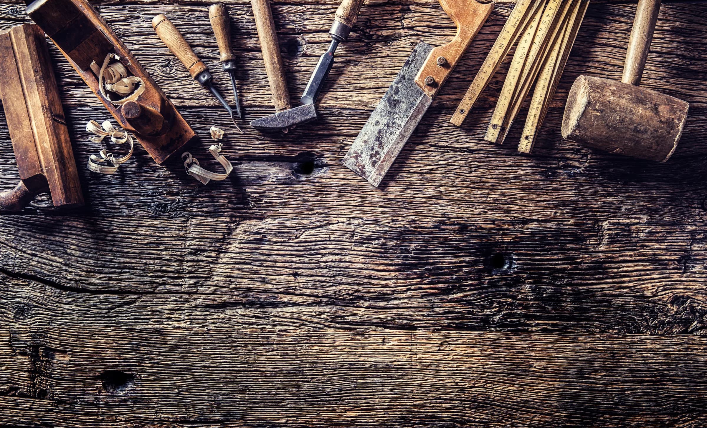 Top-down view of vintage carpenter's tools