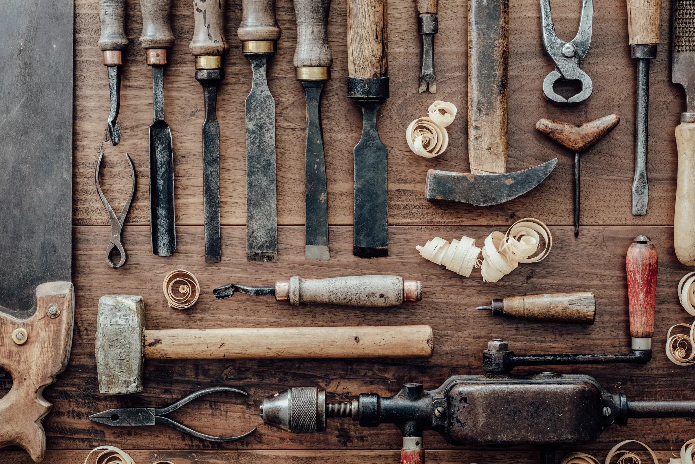 Vintage woodworking tools on a workbench